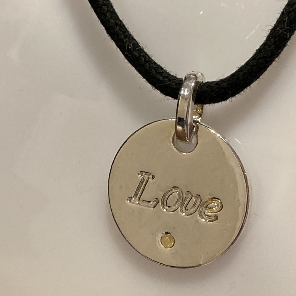 NWOT - Silvertone Love Disc Pendant Necklace With Black Adjustable Rope